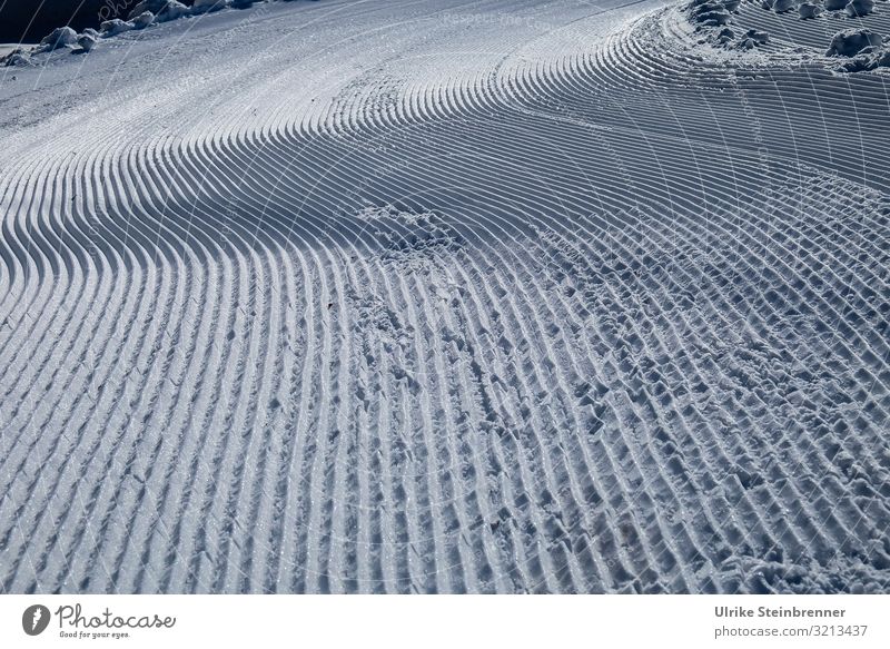 Grooves of a freshly groomed cross country ski trail in fresh snow Vacation & Travel Winter Snow Winter vacation Mountain Sports Winter sports Skiing Ski run
