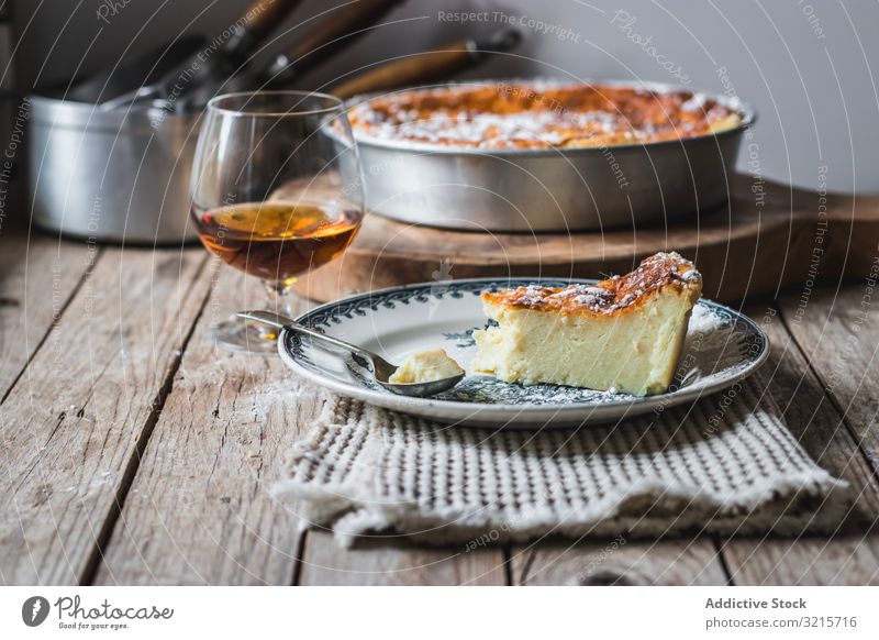 Cottage cheese pudding and glass of cognac casserole brandy baked cooking food beverage alcohol cottage dessert homemade piece prepared delicious appetizing