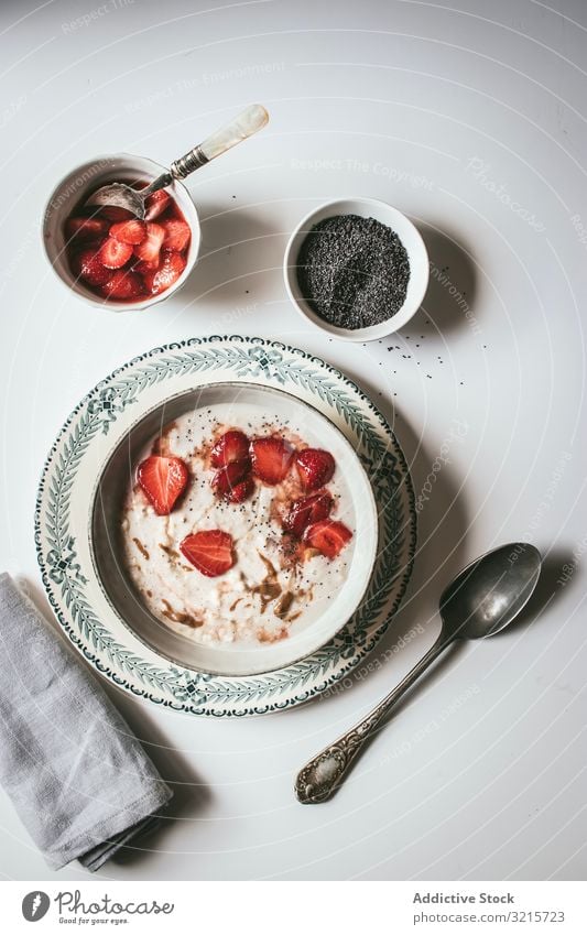 Porridge with strawberries oatmeal strawberry breakfast chia seed food delicious healthy organic eating diet ingredient culinary tasty cooked prepared dish bowl