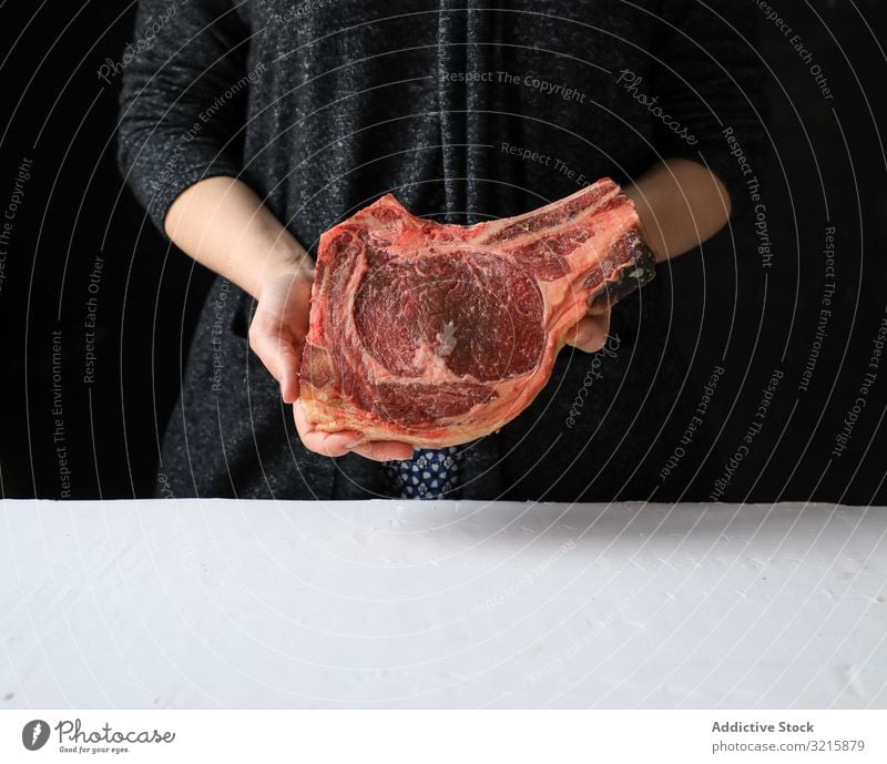 Big piece of fresh meat on bone appetizing cooking raw food protein red uncooked cow butcher preparation ingredient butchery cut beefsteak freshness rustic