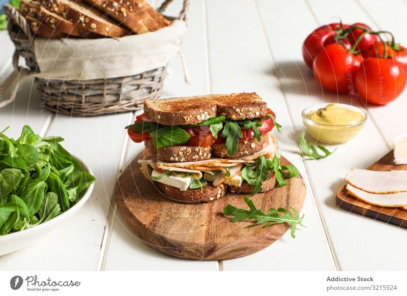 Sandwich with vegetables and cheese sandwich toast fried tomatoes ham arugula breakfast food healthy lunch bread snack meal fresh delicious tasty yummy