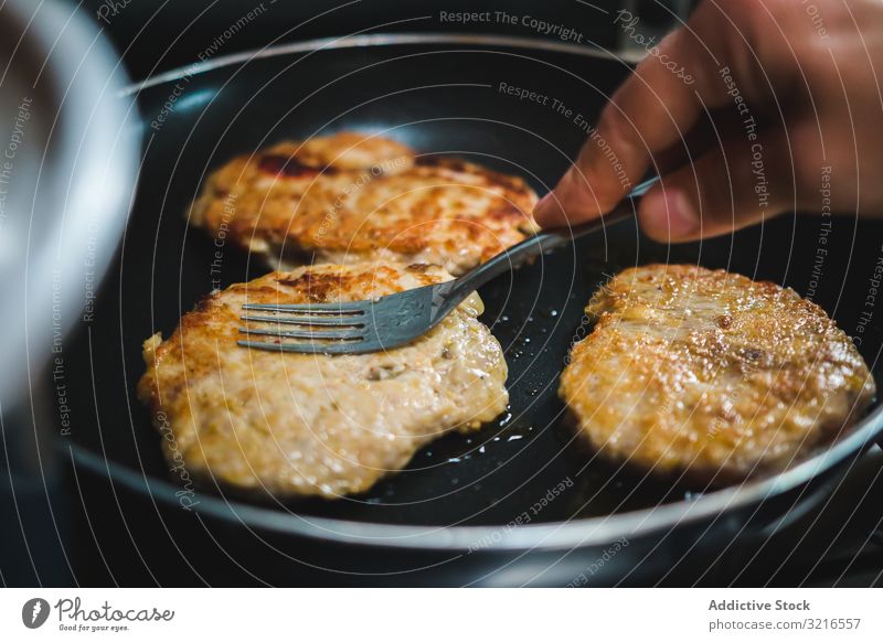Meat cutlets frying on pan oil hot kitchen cook meat food meal dinner lunch pork chicken roast delicious tasty yummy delectable palatable savory scrumptious