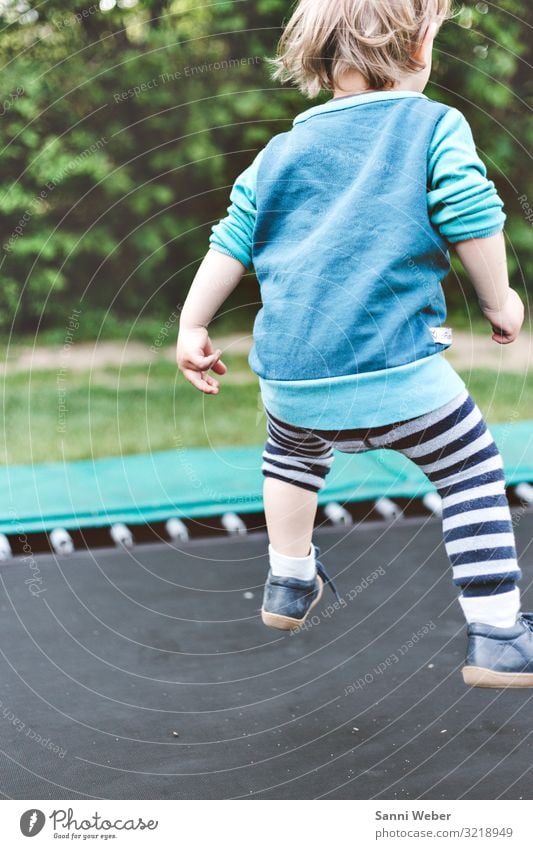 Trampoline jumping Human being Masculine Boy (child) Infancy 1 3 - 8 years Child Nature Summer Beautiful weather Plant Tree Bushes Foliage plant Park Forest