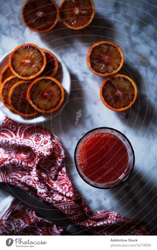 Drink made of blood orange drink fruit healthy napkin table juice diet glass slice citrus beverage fresh vitamin vegan vegetarian food smoothie cloth fabric