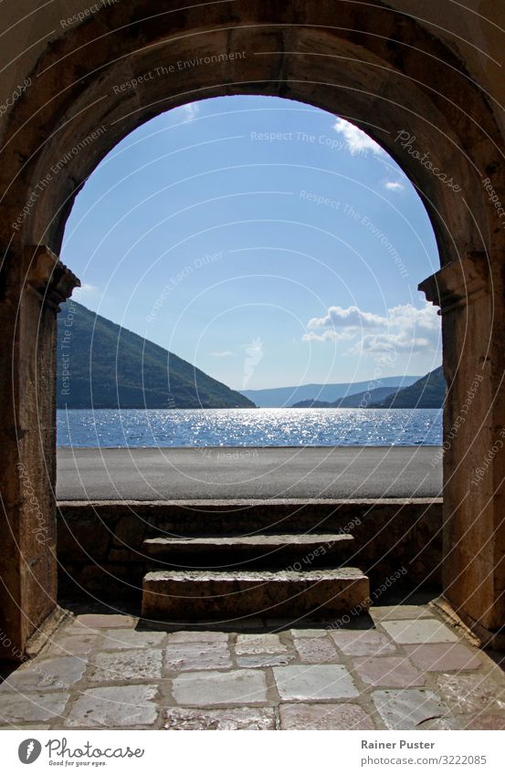 View of Kotor Bay, Montenegro Vacation & Travel Far-off places Ocean Fjord Hill Coast motor Archway Glittering Historic Clean Blue Brown Wanderlust Idyll