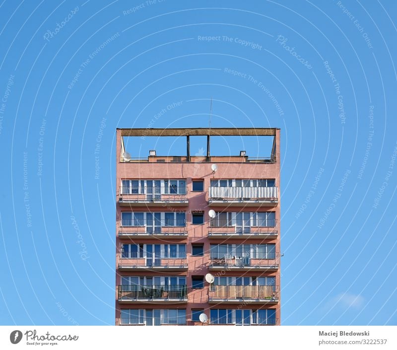 Old residential building against the blue sky Living or residing Flat (apartment) House (Residential Structure) House building Sky Small Town High-rise Building