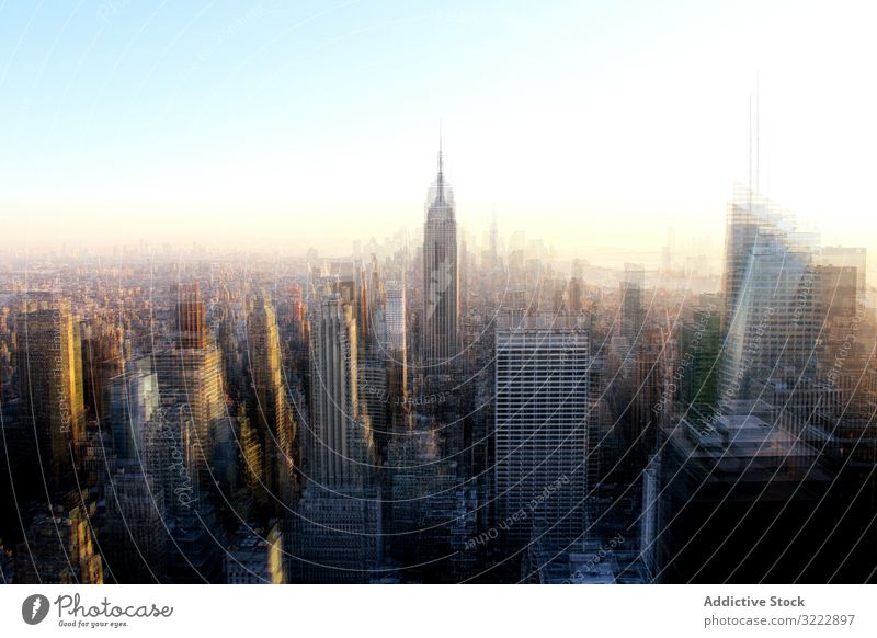 Landscape of high rise buildings in New York blurred new york skyscraper morning cityscape skyline early architecture urban sunlight sunrise america usa