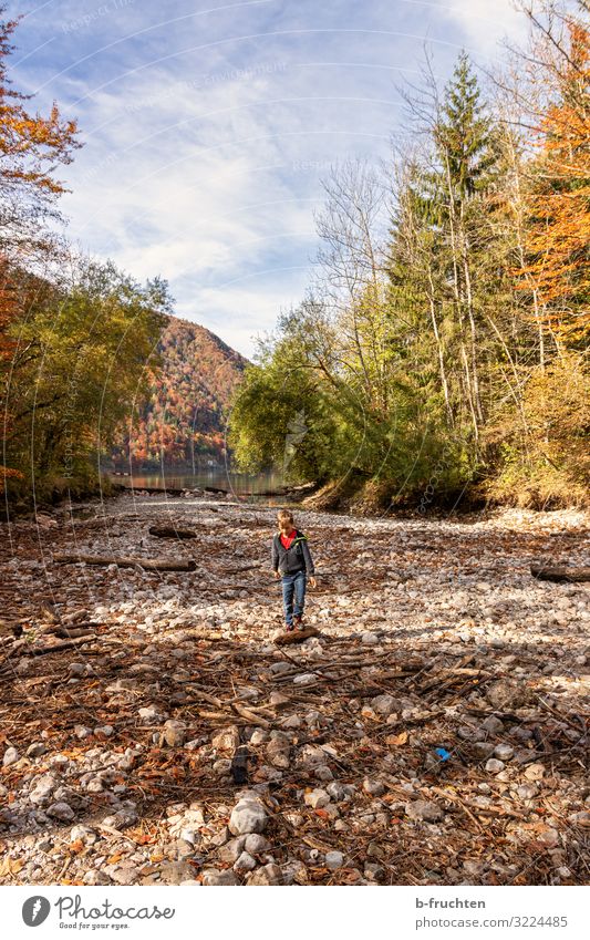Child in a dried-up riverbed Vacation & Travel Tourism Adventure Hiking 1 Human being 8 - 13 years Infancy Clouds Autumn Beautiful weather Forest Lakeside Brook