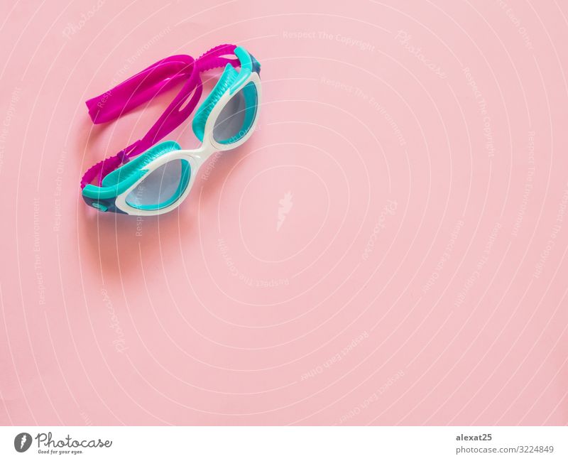 Swimming pool glasses on pink background with copy space Design Leisure and hobbies Summer Sports Internet Accessory Green Pink White Protection athlete