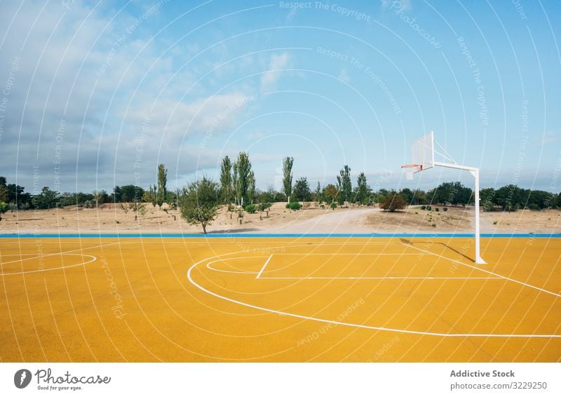 yellow basketball court outdoor. competition recreation action portrait active activity asphalt athletic city drop drops energy ethnicity exercise game leisure