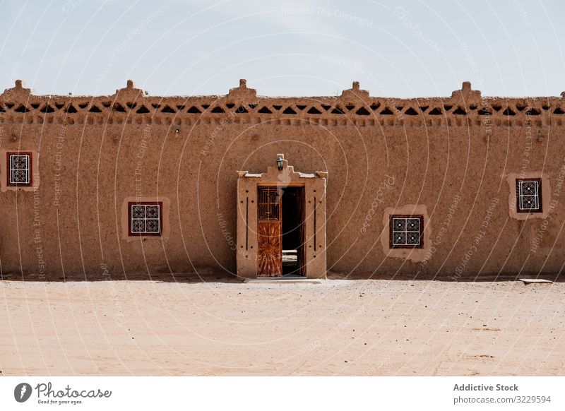 Traditional Arab houses on town street traditional arab culture exterior morocco africa sky cloudless architecture ornament building grungy weathered structure