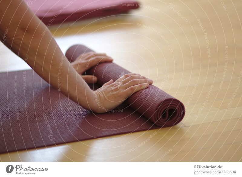 Unrolling a yoga mat Lifestyle Style Happy Healthy Athletic Fitness Well-being Contentment Relaxation Calm Meditation Leisure and hobbies Yoga Adults Arm Hand 1