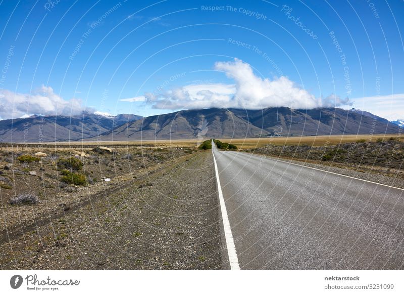 Highway in Argentinian Patagonia Summer Landscape Sky Clouds Street Vacation & Travel personal perspective vehicle shot Mountain range Vanishing point Argentina