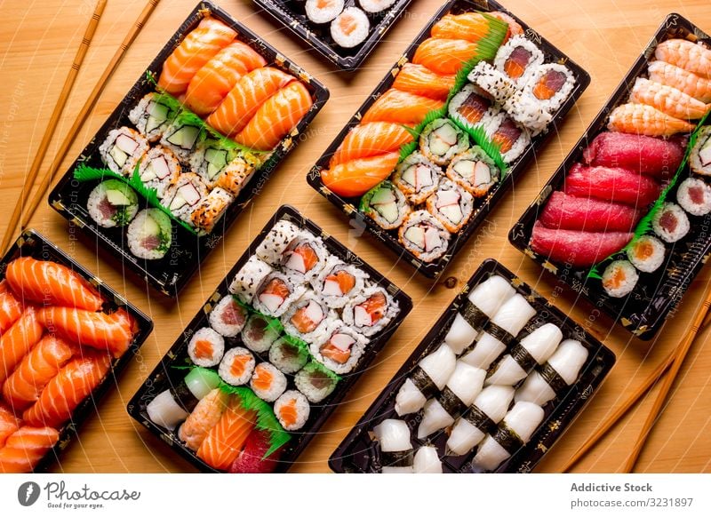Tasty sushi served in a table rolled up Sushi Plate above asia asian background chopstick fish food fresh gourmet healthy japan japanese japanese sushi