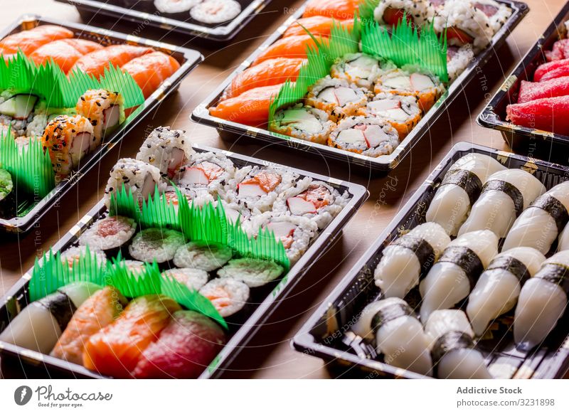 Tasty sushi served in a table rolled up Sushi Plate above asia asian background chopstick fish food fresh gourmet healthy japan japanese japanese sushi