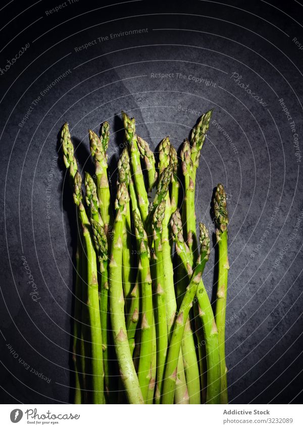 A bunch of green asparagus vegetable ingredient fresh diet food organic healthy vegetarian nutrition agriculture background white nature natural raw cuisine