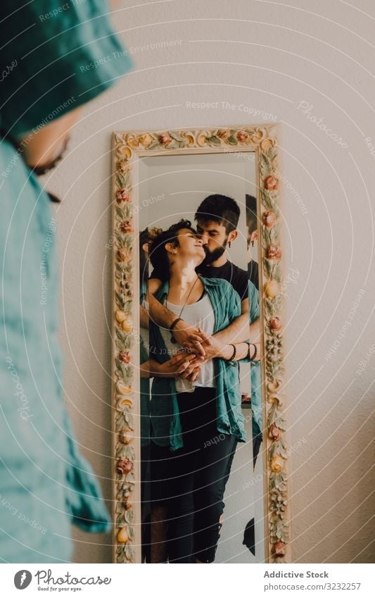 Romantic couple reflecting in rustic mirror reflection romantic shabby tender kiss sit floor home decorated cuddling love together relationship happy smiling