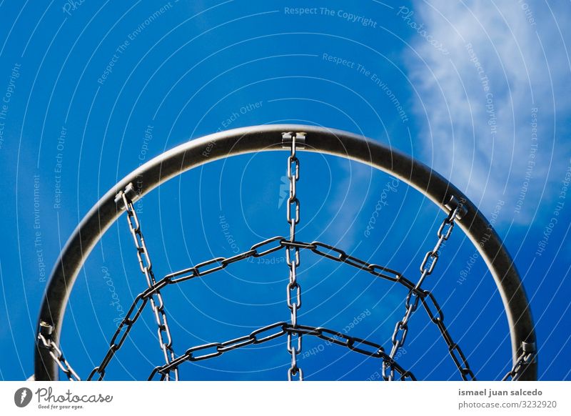 basketball hoop and blue sky on the street Basketball Sky Blue Silhouette Circle Chain Metal Net Sports Sports equipment Playing Playful Old Street Park