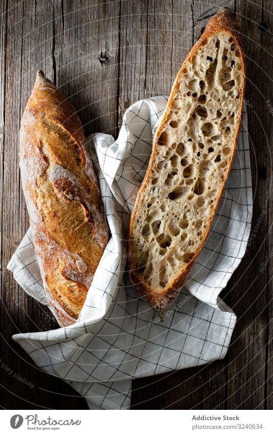 Fresh baguettes on checkered towel bread food fresh homemade delicious tasty bakery gourmet french cuisine sourdough baked product healthy appetizing pastry
