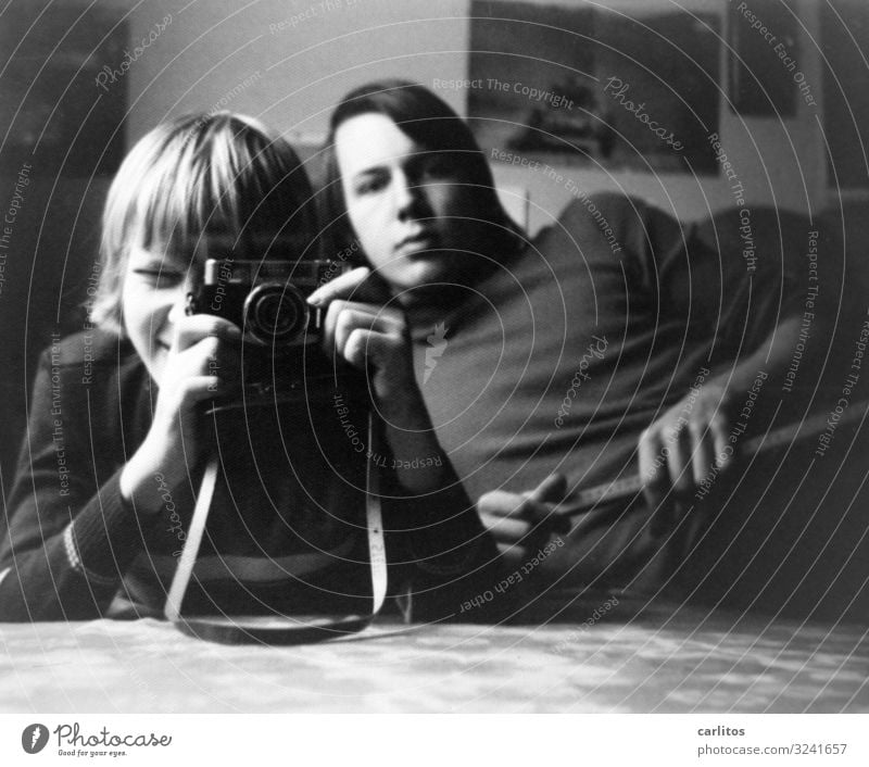 Selfie in the 70s Leisure and hobbies Camera Brother Youth (Young adults) Long-haired Dream Seventies any hair Black & white photo Experimental