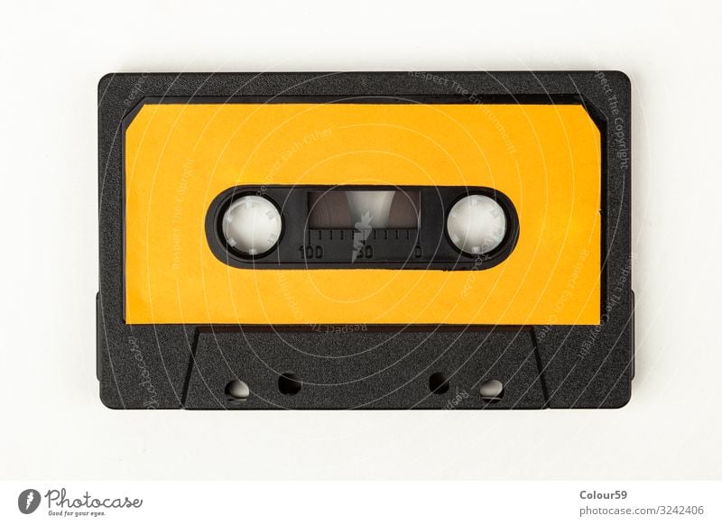 music cassette Music Audio tape Tape cassette audio cassette Plastic Retro Orange 80s Disco Background picture label vintage Analog Colour photo Studio shot