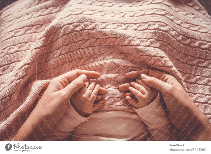 Mother holding her baby's hands Beautiful Body Skin Life Child Baby Woman Adults Parents Family & Relations Infancy Hand Fingers Love Small New Cute Soft White