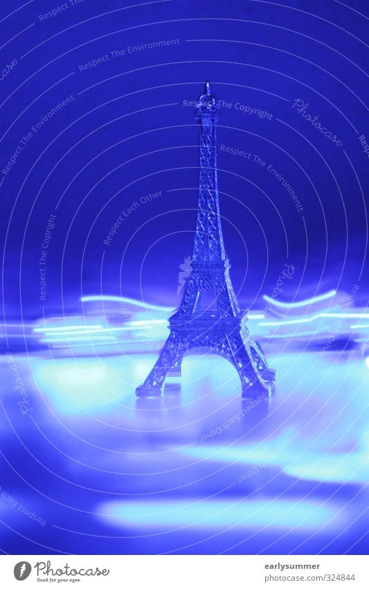 Eiffel Tower Paris surrounded by purple blue light paris city paris eiffel tower Tourism Sightseeing City trip Night life Party Going out Technology