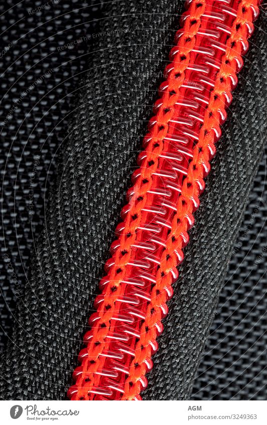 red closed zipper made of plastic Tool Fashion Clothing Packaging Decoration Plastic Strong Red Black Flexible Esthetic Movement Modern Arrangement Precision