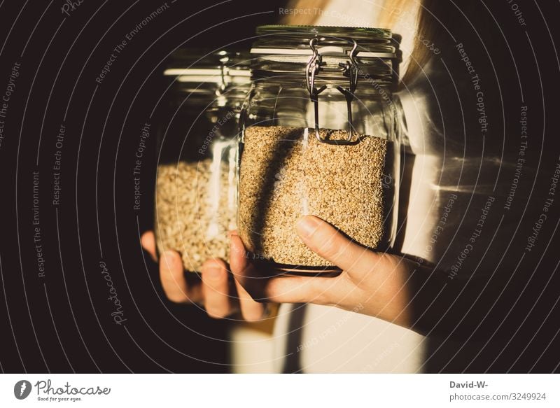 sustainable - woman with preserving jars as storage containers Sustainability sustainability Preserving jar To hold on grains do-it-yourself Healthy Eating