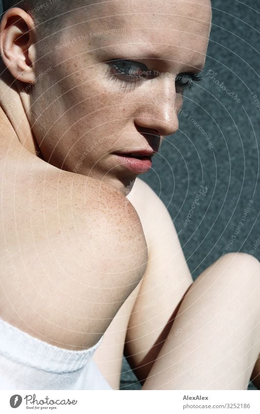 Portrait of a young woman looking over her shoulder questioningly with many freckles Style pretty Young woman Youth (Young adults) Face Shoulder Freckles