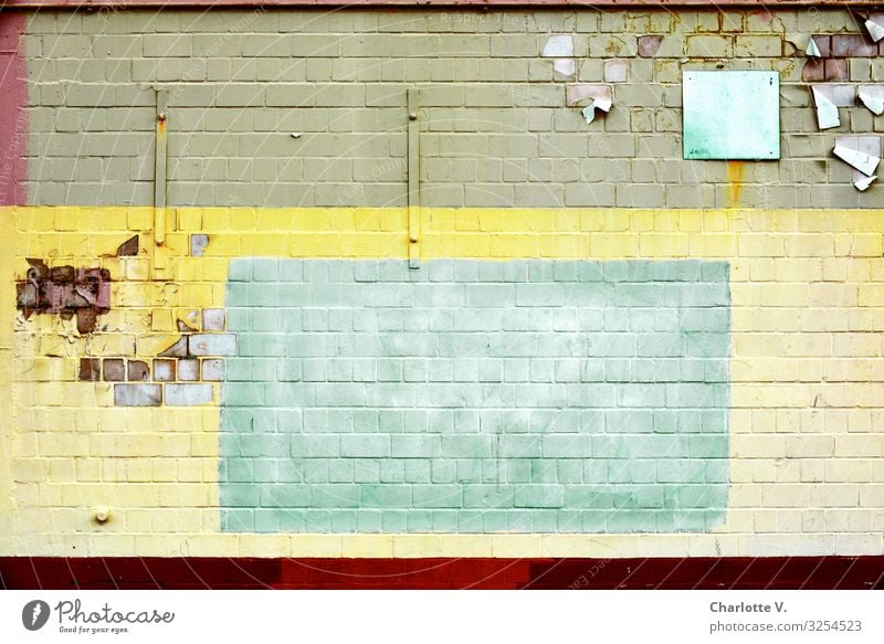 Berliner Textfreiraum | brick wall with different coloured rectangles - yellow, turquoise pastel shades with grey. Redecorate Architecture Wall (barrier)