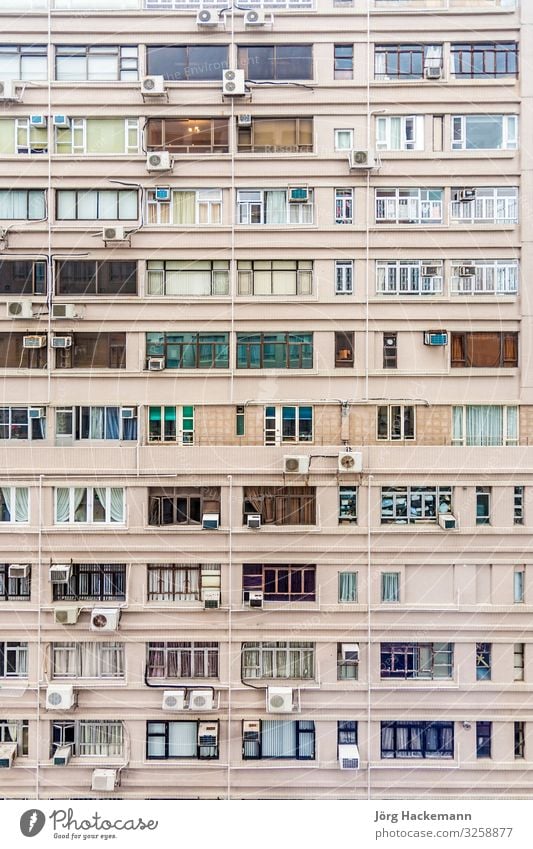 facade of an apartment house downtown Kowloon with small rooms Flat (apartment) Hongkong Asia High-rise Architecture Facade Old China Air conditioning living