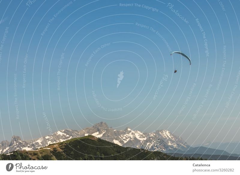 Taken off | so right; a paraglider high in the air, a mountain range in the background Leisure and hobbies Paragliding Landscape Elements Sky Horizon Spring