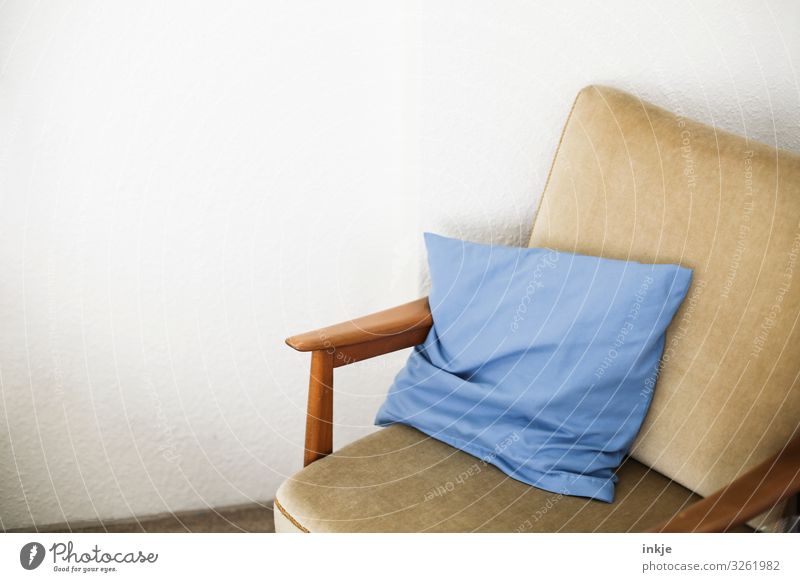 Armchair with blue cushion Deserted Cushion Copy Space top Copy Space left Wall (building) Room Empty Blue Beige vintage Interior shot Living or residing
