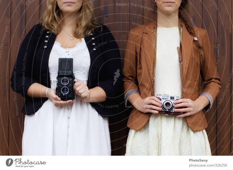 Two like one. Camera Human being Feminine Young woman Youth (Young adults) 2 Authentic Together Hip & trendy Retro Brown Black Uniqueness Colour photo