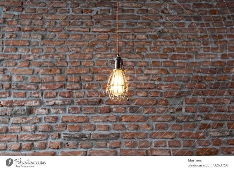 Light fixtures on a wall with bricks background. Shopping Luxury Design Interior design Decoration Lamp Industrial plant Building Architecture Brick light