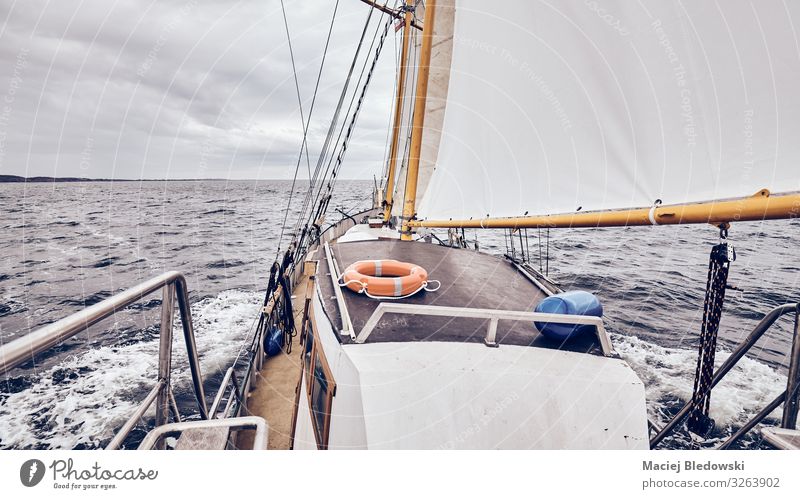Sailing old schooner on a stormy weather. Lifestyle Vacation & Travel Tourism Adventure Far-off places Freedom Cruise Ocean Sky Horizon Weather Storm Wind