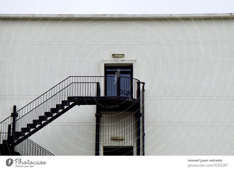 stairs and door on the white facade of the building Stairs Steps Metal Door Facade Wall (building) White Building House (Residential Structure) Architecture
