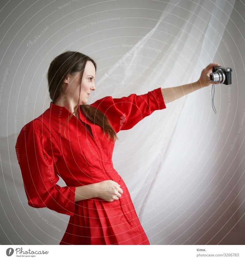 view into the camera Feminine Woman Adults 1 Human being Dress Cloth Drape Curtain Brunette Long-haired Observe To hold on Looking Red Passion Watchfulness Life