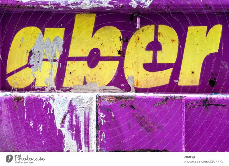 but | written Metal Characters Dirty Uniqueness Trashy Yellow Violet Colour Disagreement Communicate Colour photo Exterior shot Close-up Copy Space bottom