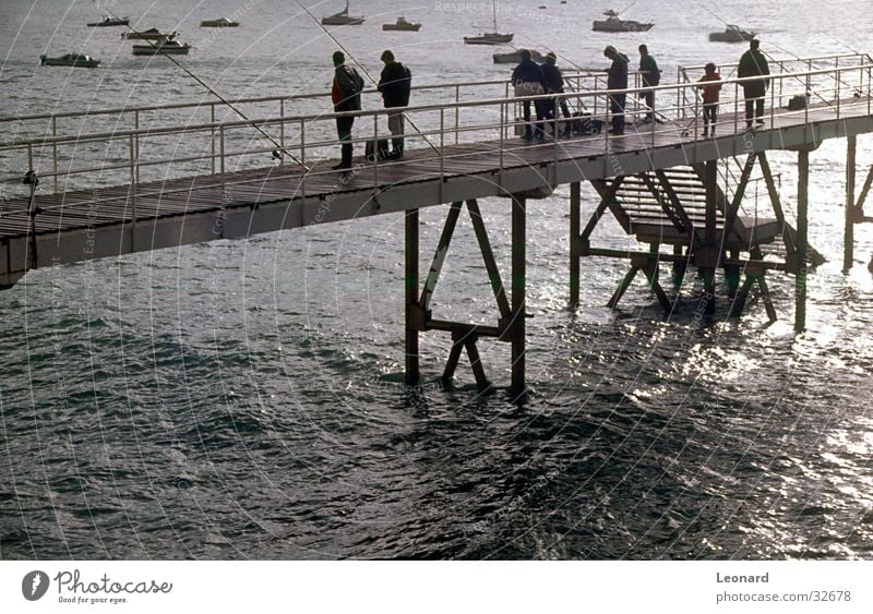 pier Jetty Watercraft Ocean Human being Fishing rod Group quay Harbour Stairs Stride