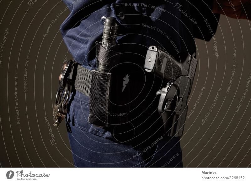 policeman equipment. Human being Man Adults Blue Safety Safety (feeling of) Protection Laws and Regulations background City Uniform military gun guard