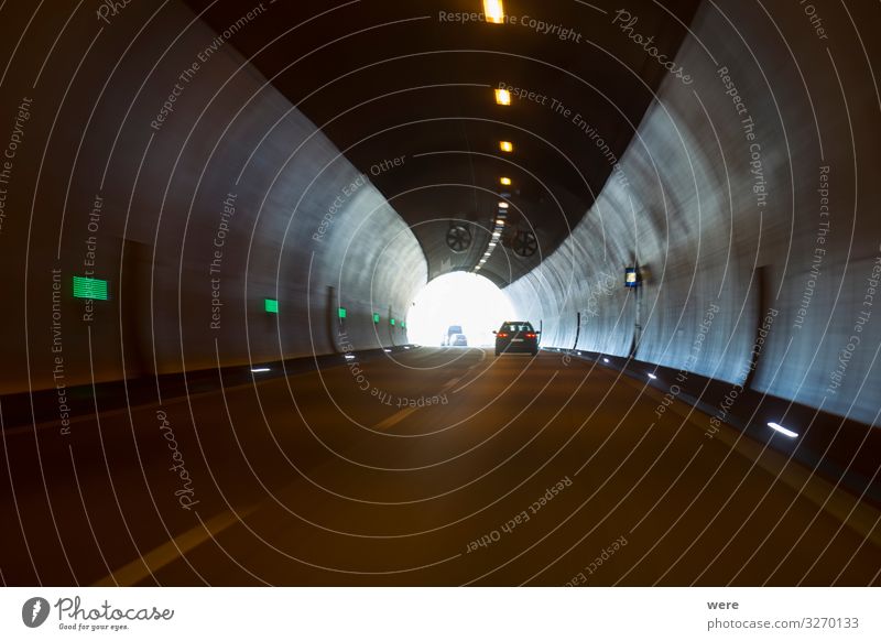 Exit of a motorway tunnel Tunnel Traffic infrastructure Driving Vacation & Travel Dark exit freeway road car drive freeway ride light at the end of the tunnel