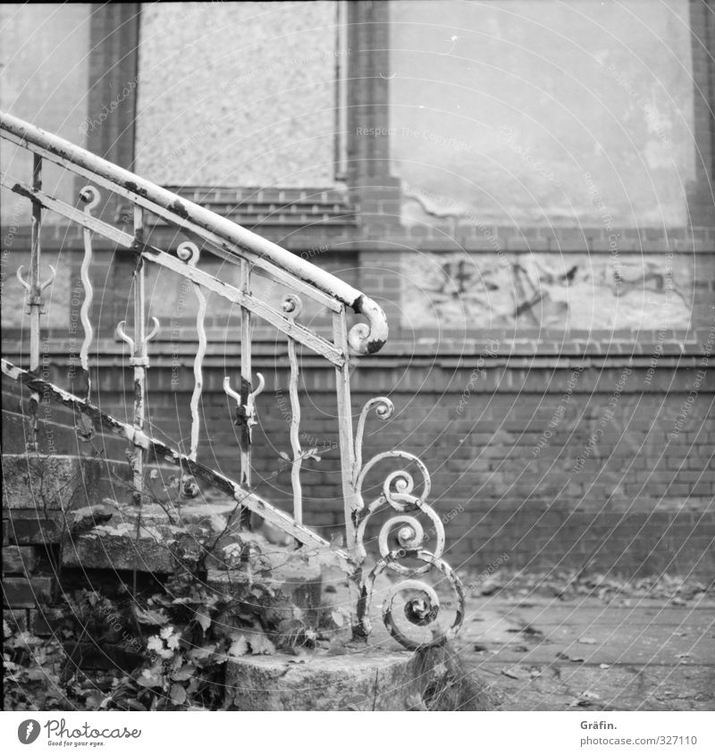 forgotten places Building Stairs Facade Metal Old Historic Broken Gray Black White Loneliness Nostalgia Decline Transience Black & white photo Exterior shot