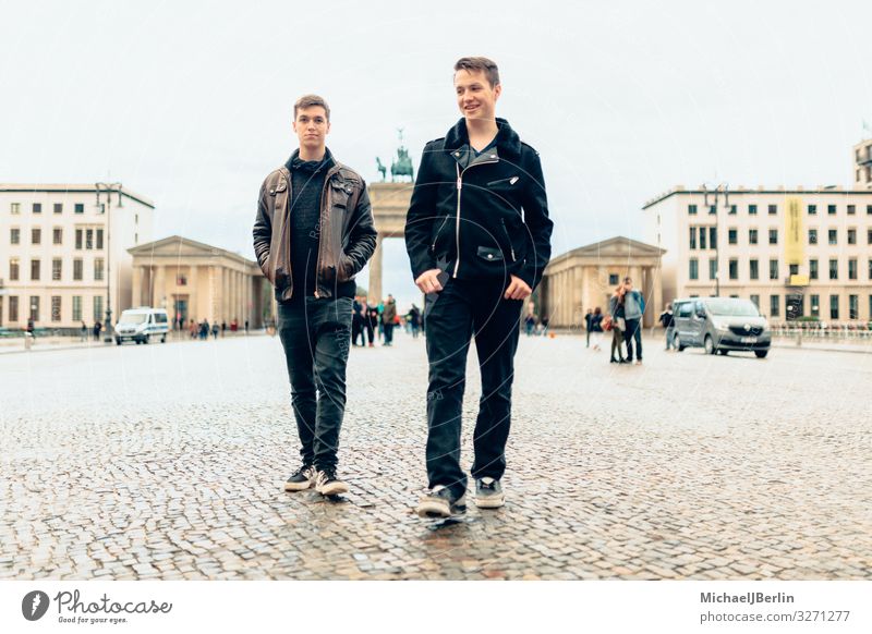Two teenage men in front of the Brandenburg Gate in Berlin Human being Masculine Young man Youth (Young adults) 2 Tourist Attraction Landmark Walking Germany