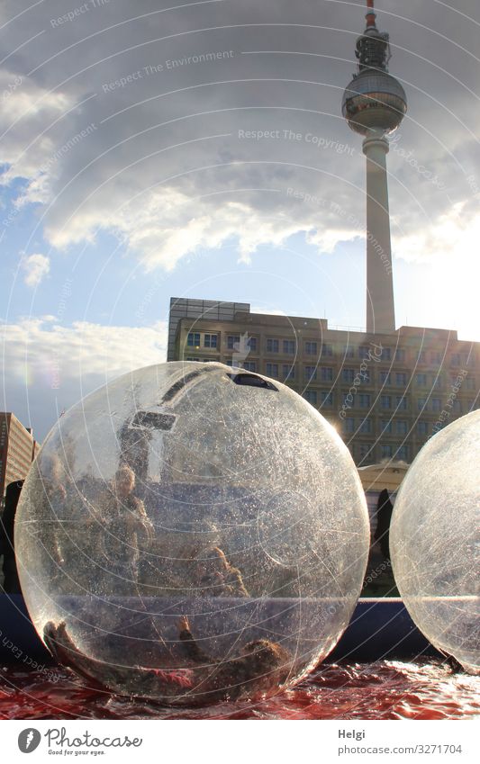 People enjoy themselves in large plastic balls in the water basin in front of the Berlin radio tower Joy Leisure and hobbies Tourism Water