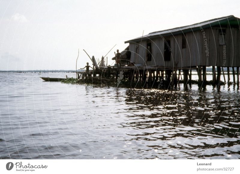 pile dwelling House (Residential Structure) Africa Lake Watercraft Human being Historic boat benin