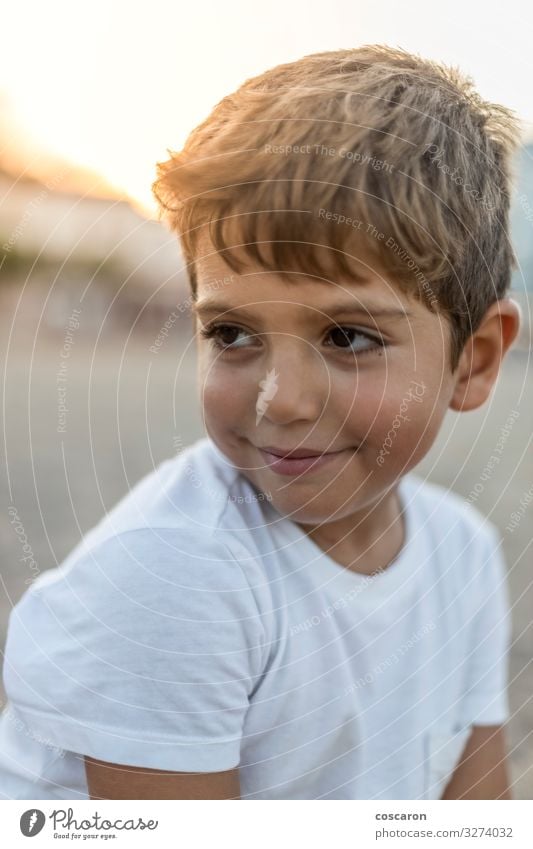 Portrait of a cute little boy at sunset Lifestyle Joy Happy Beautiful Skin Face Relaxation Playing Vacation & Travel Summer Beach Child Human being Masculine
