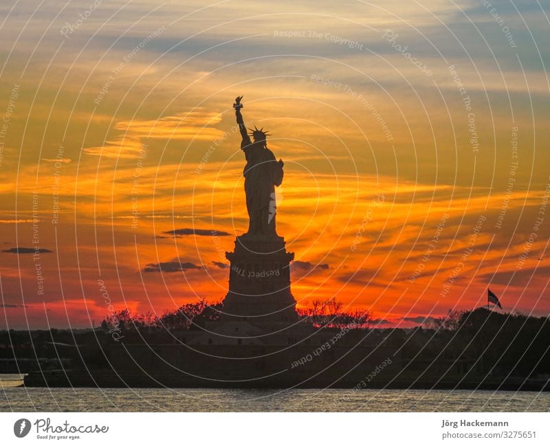 silhouette of statue of libery in New York in sunset Landscape Moody USA america landmark Sunset Torch Colour photo Evening Silhouette