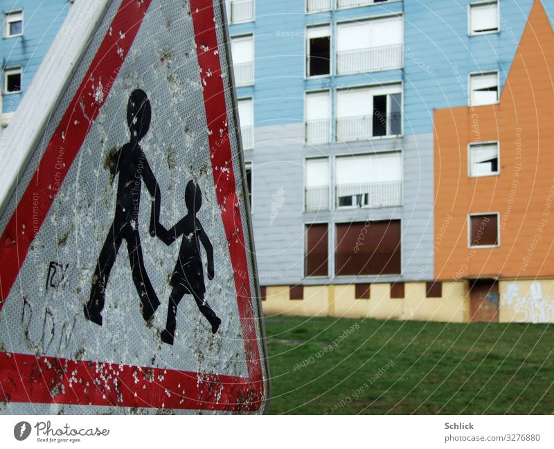 Children in danger House (Residential Structure) Ruin Facade Road sign Metal Sign children Blue Brown Green Red White Poverty Threat Infancy Decline "Children,"